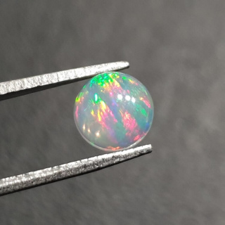 Opal from Ethiopia cabochon fi 7 mm no 426