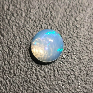 Opal from Ethiopia cabochon fi 7 mm no 434