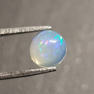 Opal from Ethiopia cabochon fi 7 mm no 434