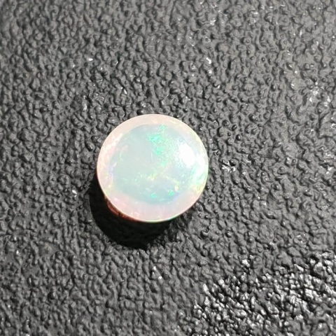 Opal from Ethiopia cabochon fi 8 mm no. 385 Opal from Ethiopia cabochon fi 8 mm no. 385