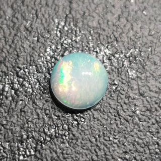 Opal from Ethiopia cabochon fi 8 mm no 386