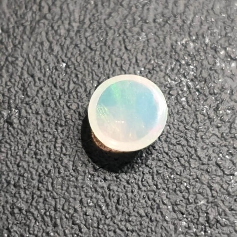 Opal from Ethiopia cabochon fi 8 mm no 386 Opal from Ethiopia cabochon fi 8 mm no 386