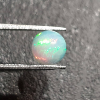 Opal from Ethiopia cabochon fi 8 mm no 387