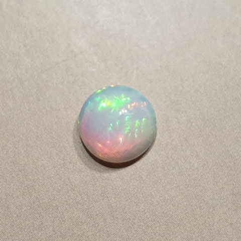 Opal from Ethiopia cabochon fi 8 mm no 387 Opal from Ethiopia cabochon fi 8 mm no 387