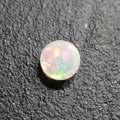 Opal from Ethiopia cabochon fi 8 mm no 393 Opal from Ethiopia cabochon fi 8 mm no 393