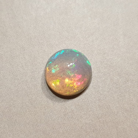 Opal from Ethiopia cabochon fi 8 mm no 395 Opal from Ethiopia cabochon fi 8 mm no 395