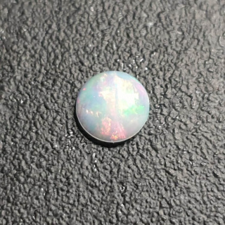 Opal from Ethiopia cabochon fi 8 mm no 396
