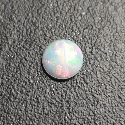 Opal from Ethiopia cabochon fi 8 mm no 396 Opal from Ethiopia cabochon fi 8 mm no 396