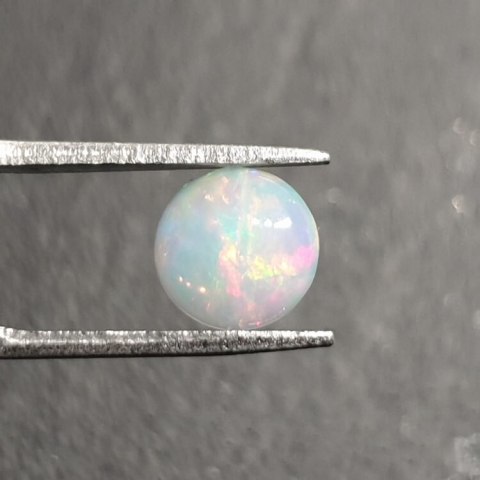 Opal from Ethiopia cabochon fi 8 mm no 396 Opal from Ethiopia cabochon fi 8 mm no 396