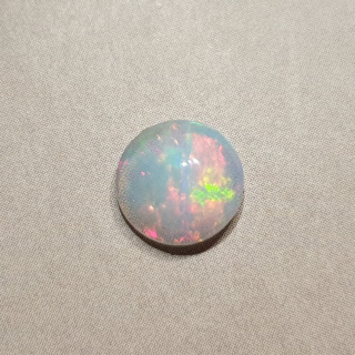 Opal from Ethiopia cabochon fi 8 mm no 396