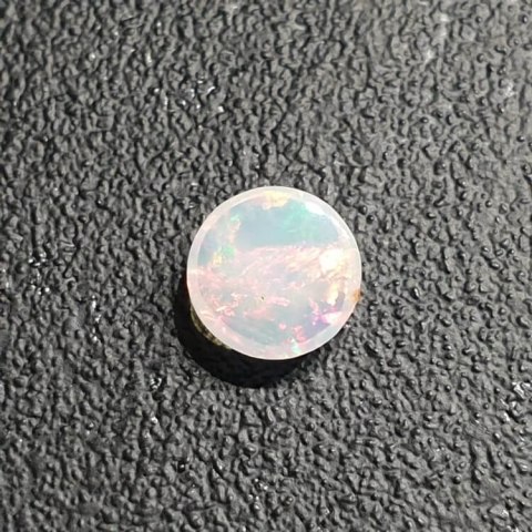 Opal from Ethiopia cabochon fi 8 mm no 396 Opal from Ethiopia cabochon fi 8 mm no 396