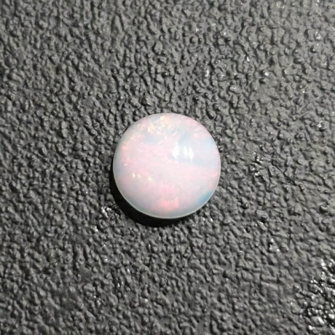 Opal from Ethiopia cabochon fi 8 mm no 397 Opal from Ethiopia cabochon fi 8 mm no 397