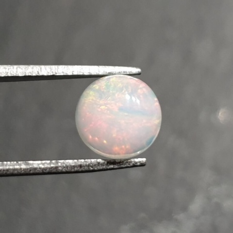 Opal from Ethiopia cabochon fi 8 mm no 397 Opal from Ethiopia cabochon fi 8 mm no 397