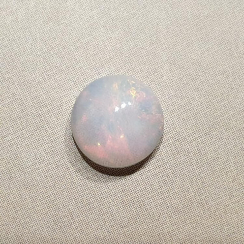 Opal from Ethiopia cabochon fi 8 mm no 397 Opal from Ethiopia cabochon fi 8 mm no 397