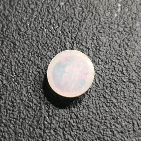 Opal from Ethiopia cabochon fi 8 mm no 397 Opal from Ethiopia cabochon fi 8 mm no 397