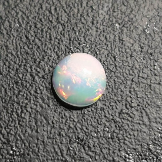 Opal from Ethiopia cabochon fi 8 mm no 398