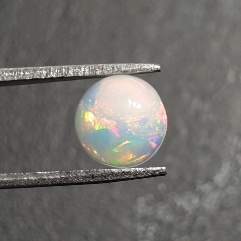 Opal from Ethiopia cabochon fi 8 mm no 398 Opal from Ethiopia cabochon fi 8 mm no 398