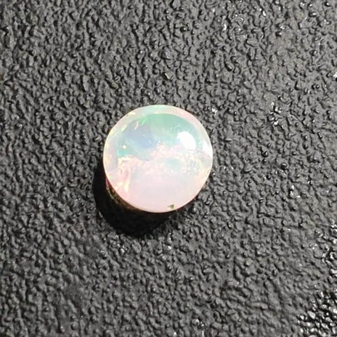 Opal from Ethiopia cabochon fi 8 mm no 398 Opal from Ethiopia cabochon fi 8 mm no 398