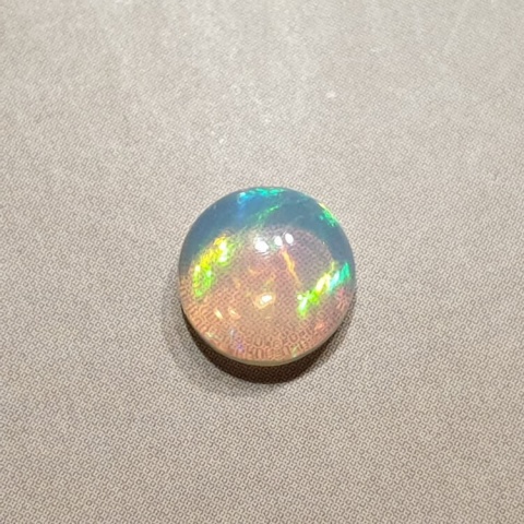 Opal from Ethiopia cabochon fi 8 mm no. 403 Opal from Ethiopia cabochon fi 8 mm no. 403