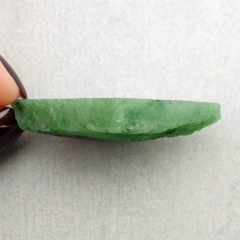 Zoisite with ruby cut raw 26x28 mm no. 22 Zoisite with ruby cut raw 26x28 mm no. 22