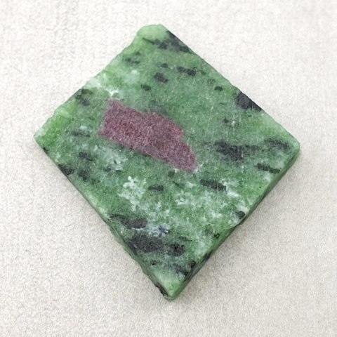 Zoisite with ruby cut raw 27x25 mm no. 15 Zoisite with ruby cut raw 27x25 mm no. 15