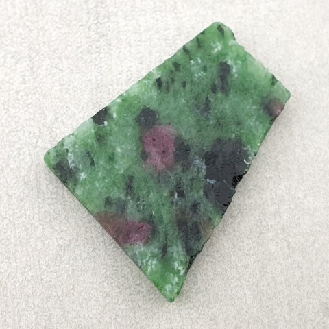 Zoisite with ruby cut raw 29x24 mm no. 50 Zoisite with ruby cut raw 29x24 mm no. 50