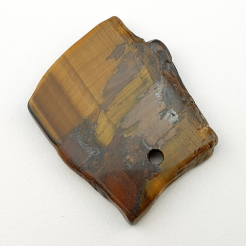 Tiger's eye slice with hole 35x30 mm No 19 Tiger's eye slice with hole 35x30 mm No 19