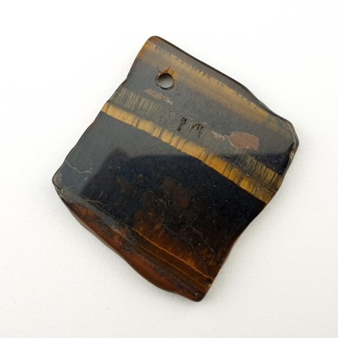 Tiger's eye slice with hole 36x33 mm no 18 Tiger's eye slice with hole 36x33 mm no 18