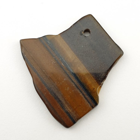 Tiger's eye slice with hole 37x39 mm No 29 Tiger's eye slice with hole 37x39 mm No 29