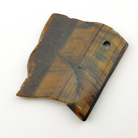 Tiger's eye slice with hole 38x31 mm No 5 Tiger's eye slice with hole 38x31 mm No 5