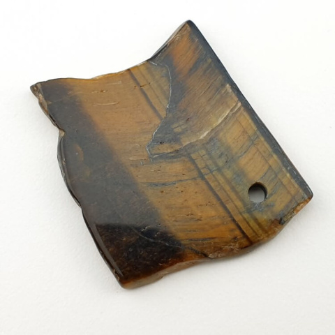 Tiger's eye slice with hole 38x31 mm No 5 Tiger's eye slice with hole 38x31 mm No 5