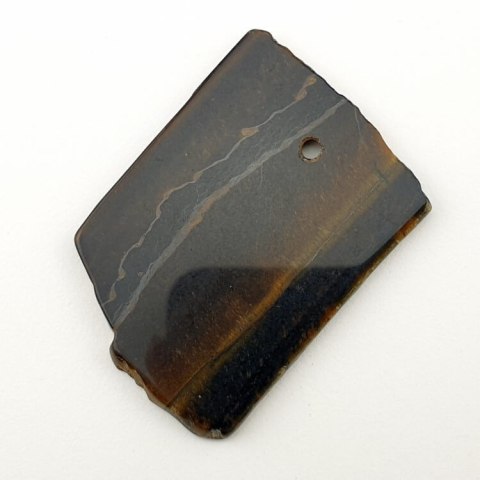 Tiger's eye patch with hole 47x34 mm No 10 Tiger's eye patch with hole 47x34 mm No 10