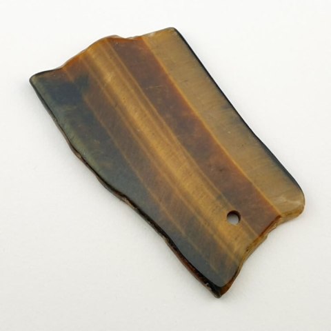 Tiger's eye slice with hole 58x32 mm No 17 Tiger's eye slice with hole 58x32 mm No 17