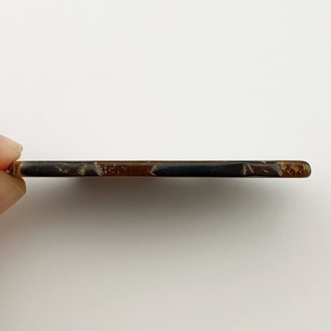 Tiger's eye slice with hole 66x31 mm No 26 Tiger's eye slice with hole 66x31 mm No 26
