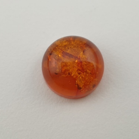 Bursztyn bałtycki kaboszon fi 10 mm nr 587 Bursztyn bałtycki kaboszon fi 10 mm nr 587