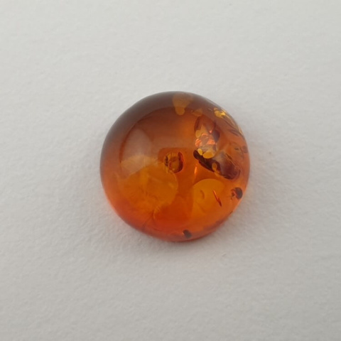 Bursztyn bałtycki kaboszon fi 10 mm nr 605 Bursztyn bałtycki kaboszon fi 10 mm nr 605
