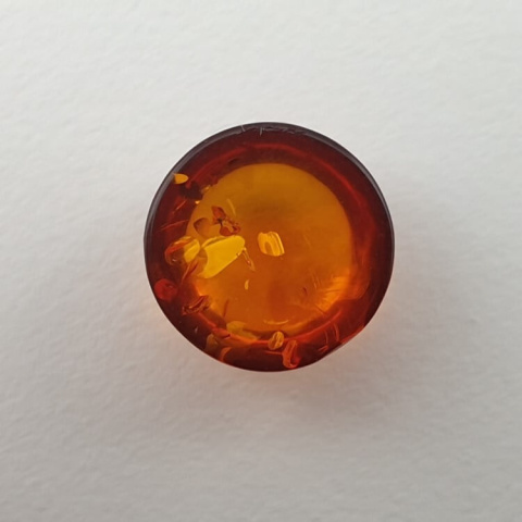 Bursztyn bałtycki kaboszon fi 10 mm nr 605 Bursztyn bałtycki kaboszon fi 10 mm nr 605