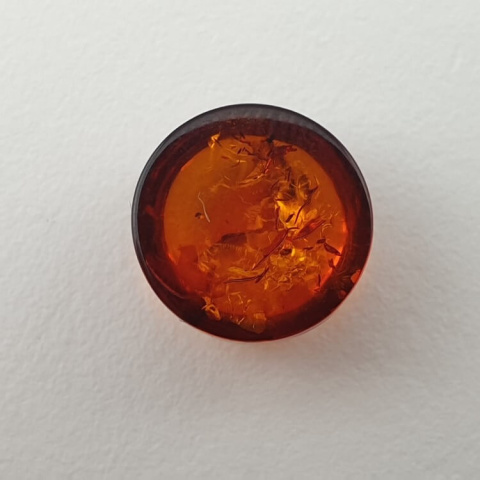Bursztyn bałtycki kaboszon fi 10 mm nr 643 Bursztyn bałtycki kaboszon fi 10 mm nr 643