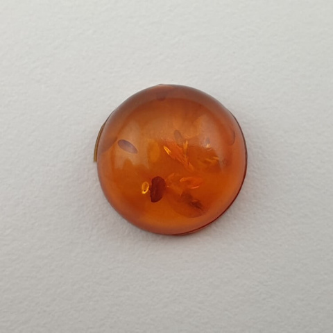 Bursztyn bałtycki kaboszon fi 10 mm nr 648 Bursztyn bałtycki kaboszon fi 10 mm nr 648