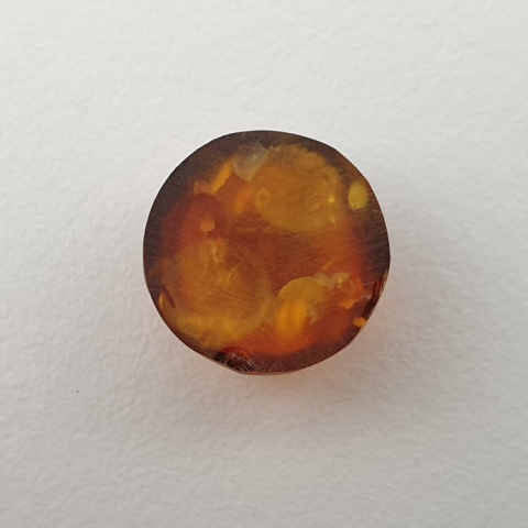 Bursztyn bałtycki kaboszon fi 10 mm nr 652 Bursztyn bałtycki kaboszon fi 10 mm nr 652