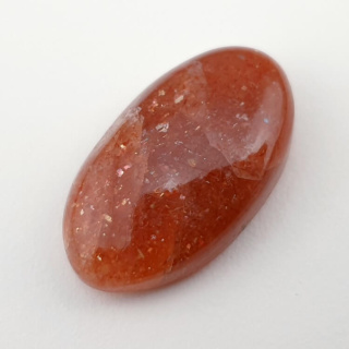 Kamień słoneczny kaboszon 25x15 mm nr 62