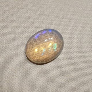 Opal from Ethiopia cabochon 8.90x6.81 mm no 129