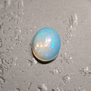 Opal from Ethiopia cabochon 8.90x7.02 mm no. 137