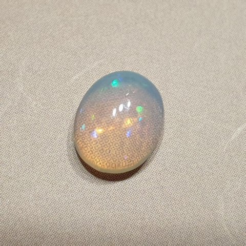 Opal from Ethiopia cabochon 8.90x7.02 mm no 137 Opal from Ethiopia cabochon 8.90x7.02 mm no 137