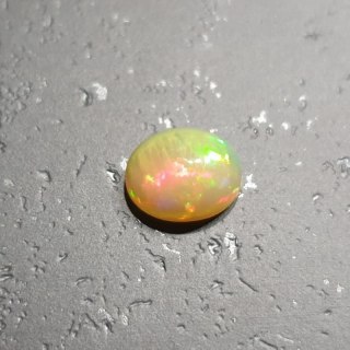 Opal from Ethiopia cabochon 9.02x7.11 mm no 121