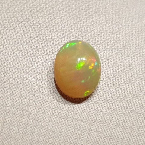 Opal from Ethiopia cabochon 9.02x7.11 mm no. 121 Opal from Ethiopia cabochon 9.02x7.11 mm no. 121