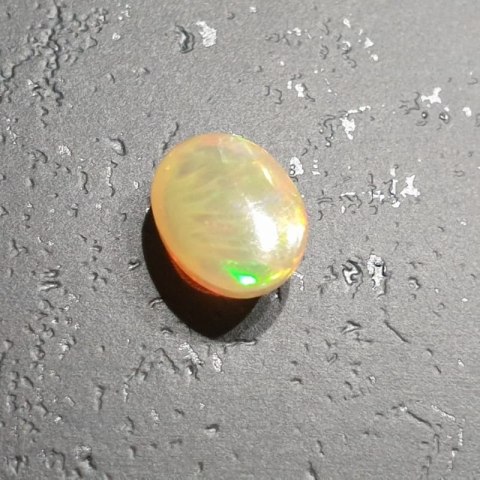 Opal from Ethiopia cabochon 9.02x7.11 mm no. 121 Opal from Ethiopia cabochon 9.02x7.11 mm no. 121
