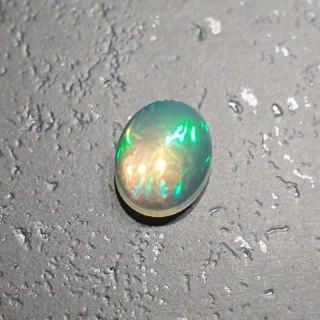Opal from Ethiopia cabochon 9.05x7.19 mm no 118