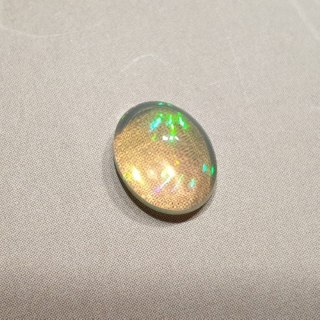 Opal from Ethiopia cabochon 9.05x7.19 mm no 118