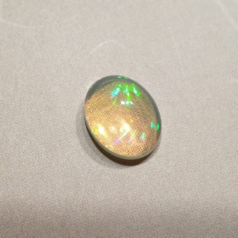 Opal from Ethiopia cabochon 9.05x7.19 mm no 118 Opal from Ethiopia cabochon 9.05x7.19 mm no 118